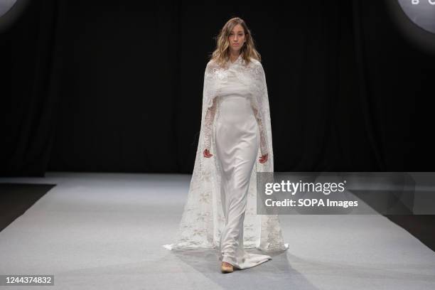 Model walks the runway at the Nicolas Montenegro fashion show during the 1001 Bodas Madrid Fashion Week at the Ifema in Madrid.