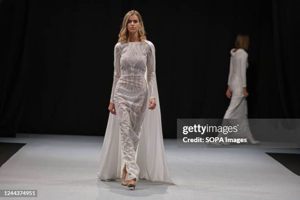 Model walks the runway at the Nicolas Montenegro fashion show during the 1001 Bodas Madrid Fashion Week at the Ifema in Madrid.