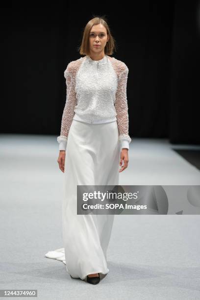 Model walks the runway at the Lucía Cano fashion show during the 1001 Bodas Madrid Fashion Week at the Ifema in Madrid.