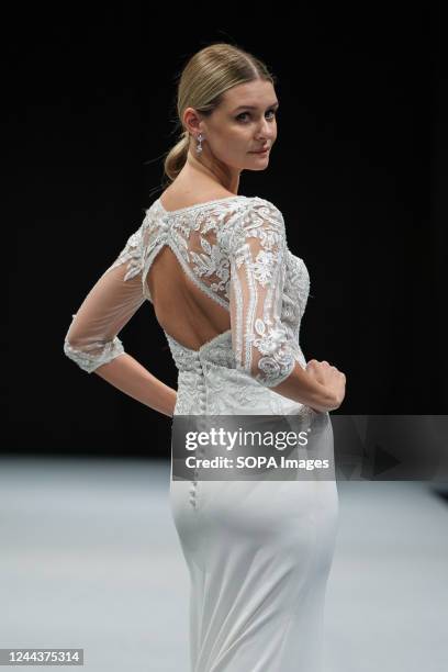 Model walks the runway at the Vertize Gala fashion show during the 1001 Bodas Madrid Fashion Week at the Ifema in Madrid.