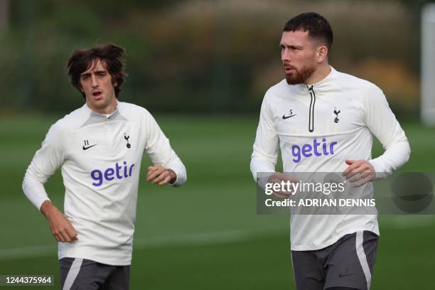 Tottenham Hotspur's Spanish striker Bryan Gil and Tottenham Hotspur's Danish midfielder Pierre-Emile Hojbjerg attend a team training session at the...