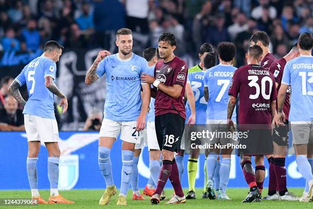 Sergej Milinkovic-Savic of SS Lazio protests with the referee Gianluca Manganiello receiving a yellow card during the Serie A match between SS Lazio...