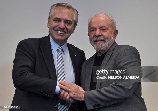 Argentina's President Alberto Fernandez and Brazil's President-elect Luiz Inacio Lula da Silva pose for pictures during a meeting in Sao Paulo,...