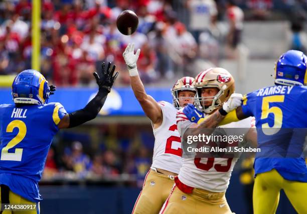 Inglewood, CA San Francisco 49ers running back Christian McCaffrey, #23, throws a touchdown pass to wide receiver Brandon Aiyuk in the second...