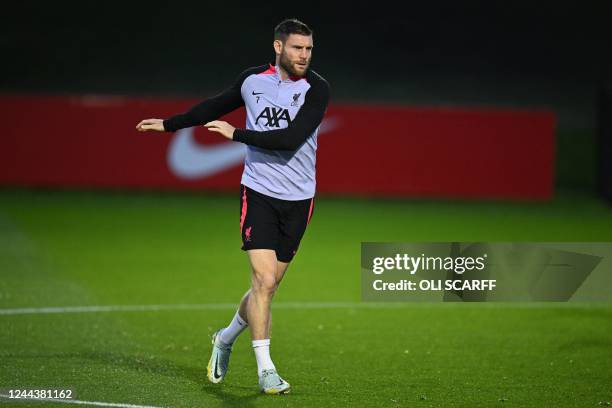 Liverpool's English midfielder James Milner attends a team training session at the AXA Training Centre in Liverpool, north-west England on October 31...