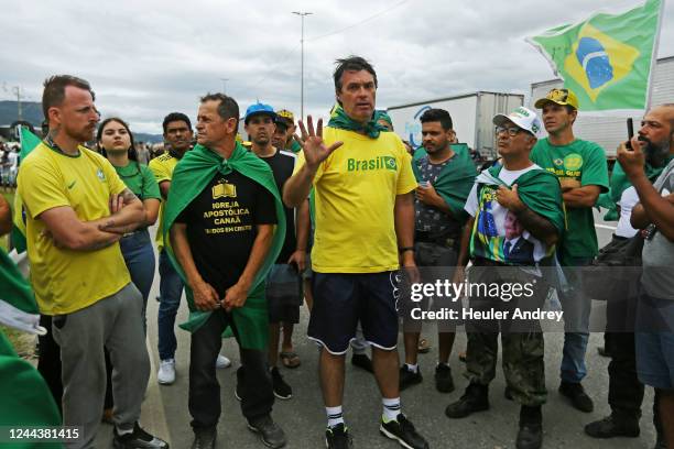 Truck drivers and supporters of President Jair Bolsonaro block Via Dutra to protest against the results of the presidential run-off on October 31,...