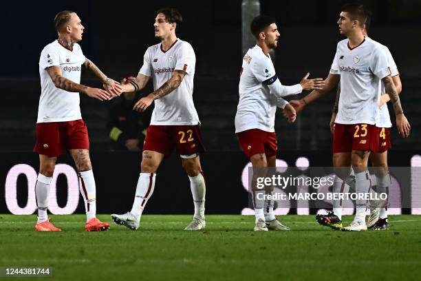 Romas Italian forward Nicolo Zaniolo celebrates after scoring a first goal for his team with AS Romas Dutch defender Rick Karsdorp during the Italian...