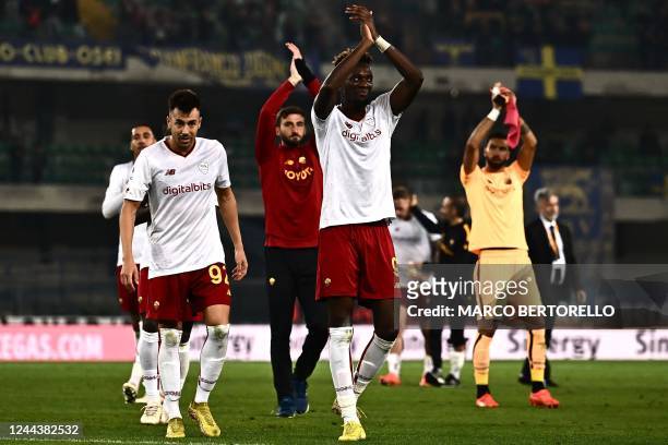 Romas Nigerian forward Tammy Abraham from Nigeria celebrates at the end of the Italian Serie A football match between Hellas Verona and AS Roma at...