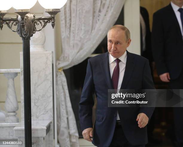 Russian President Vladimir Putin enters the hall during his press conference at the Rus Sanatorium , October 2022, in Sochi, Russia. Leaders of...