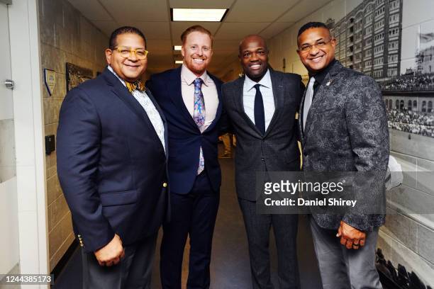 Roberto Clemente Award Winner Justin Turner of the Los Angeles Dodgers poses for a photo with former Roberto Clemente Award winner Harold Reynolds...