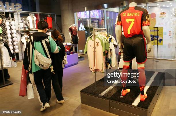 Official 2022 Qatar World Cup jerseys and soccer balls are displayed at the Adidas flagship store in Shanghai, China, Oct 29, 2022.
