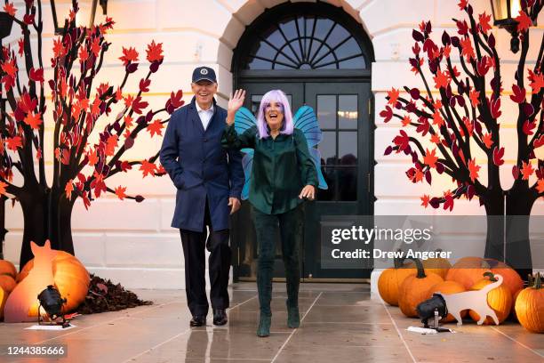 President Joe Biden and first lady Jill Biden arrive to greet trick-or-treaters during a Halloween event on the South Lawn of the White House October...