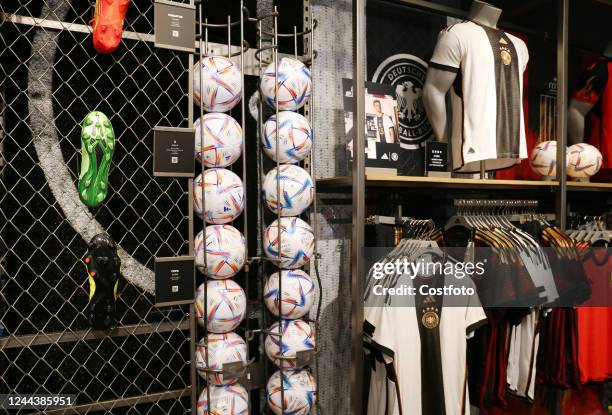 Official 2022 Qatar World Cup jerseys and soccer balls are displayed at the Adidas flagship store in Shanghai, China, Oct 29, 2022.