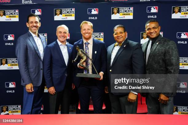 Andy Navarrete, EVP, External Affairs, Capital One, MLB Commissioner Robert D. Manfred, Jr., 2022 Roberto Clemente Award winner Justin Turner of the...