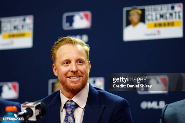 Roberto Clemente Award winner Justin Turner of the Los Angeles Dodgers speaks during the Clemente Award press conference prior to Game 3 of the 2022...
