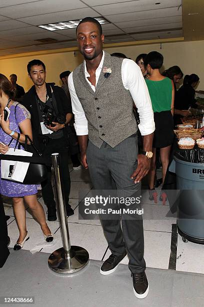 Player Dwyane Wade poses backstage at the Rag & Bone Project Spring 2012 fashion show during Mercedes-Benz Fashion Week at 330 West Street on...