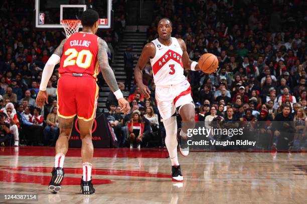 Anunoby of the Toronto Raptors dribbles the ball during the game against the Atlanta Hawks on October 31, 2022 at the Scotiabank Arena in Toronto,...