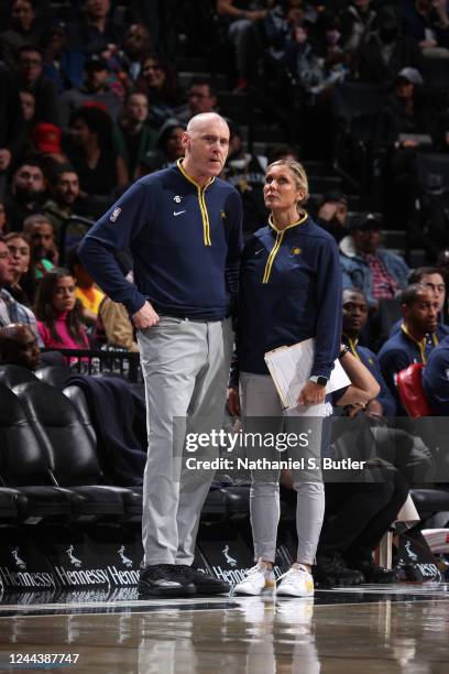 Head Coach Rick Carlisle talks to Assistant Coach Jenny Boucek of the Indiana Pacers during the game against the Brooklyn Nets on October 31, 2022 at...