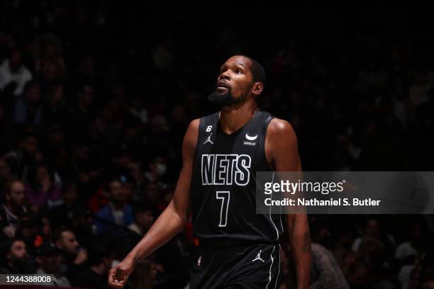 Kevin Durant of the Brooklyn Nets looks on during the game against the Indiana Pacers on October 31, 2022 at Barclays Center in Brooklyn, New York....