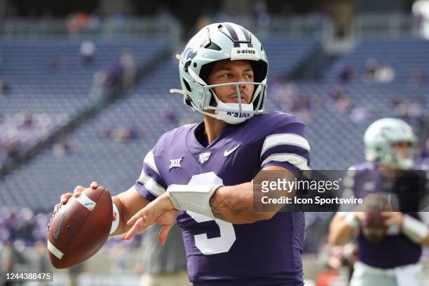 Kansas State Wildcats quarterback Adrian Martinez throws a pass before a Big 12 college football game between the Oklahoma State Cowboys and Kansas...