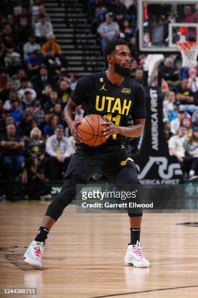 Mike Conley of the Utah Jazz looks to pass the ball during the game against the Memphis Grizzlies on October 31, 2022 at Vivint SmartHome Arena in...