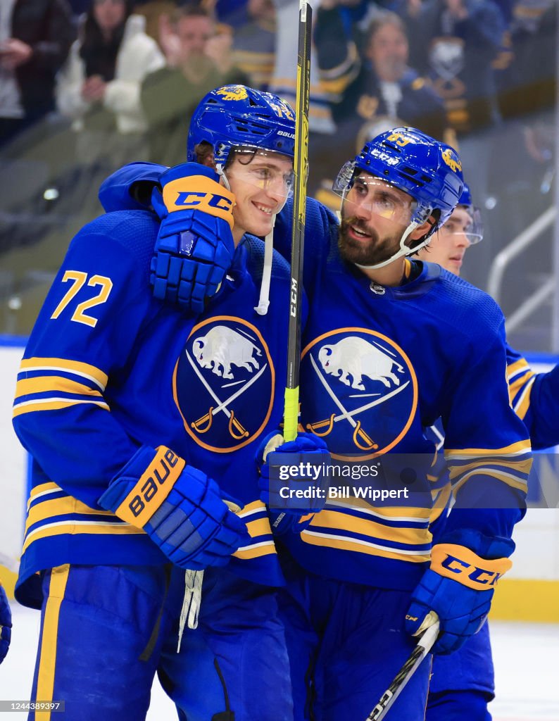 Tage Thompson of the Buffalo Sabres celebrates with Alex Tuch