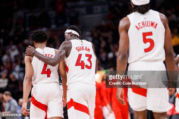 Pascal Siakam chats with Scottie Barnes of the Toronto Raptors during a break against the Atlanta Hawks at Scotiabank Arena on October 31, 2022 in...