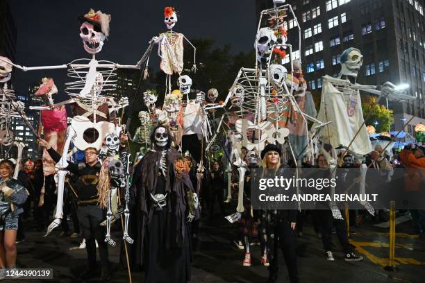 Revellers march in costumes during the 49th Annual Halloween parade in Greenwich Village, New York on October 31, 2022.