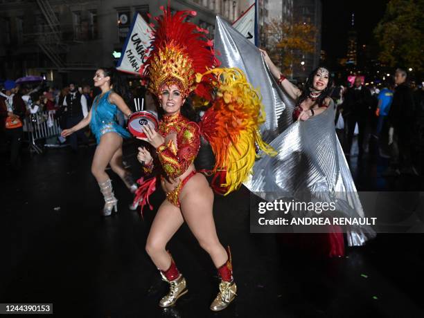 Revellers march in costumes during the 49th Annual Halloween parade in Greenwich Village, New York on October 31, 2022.