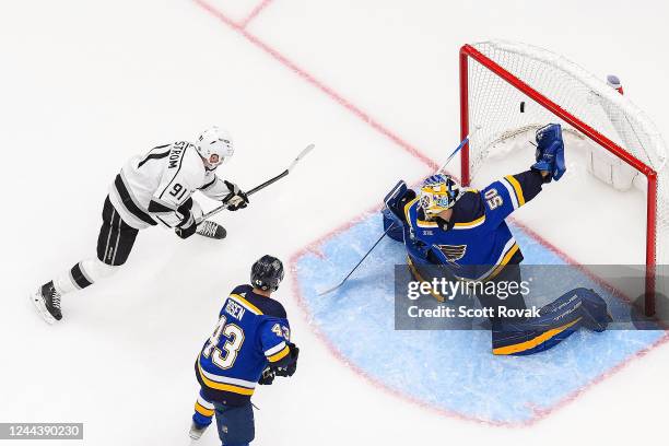 Carl Grundstrom of the Los Angeles Kings scores a goal against Jordan Binnington of the St. Louis Blues at the Enterprise Center on October 31, 2022...