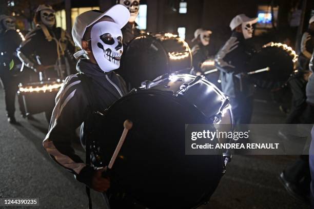 Revellers march in costumes during the 49th Annual Halloween parade in Greenwich Village, New York on October 31, 2022.