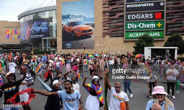 Participants take part in the Pride Parade on October 29, 2022 in Johannesburg, South Africa. The parade is an outdoor event that celebrates lesbian,...