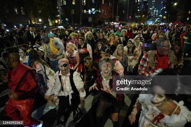 Revelers wearing different costumes attend the Halloween Parade in Lower Manhattan of New York, United States on October 31, 2022. New York City's...