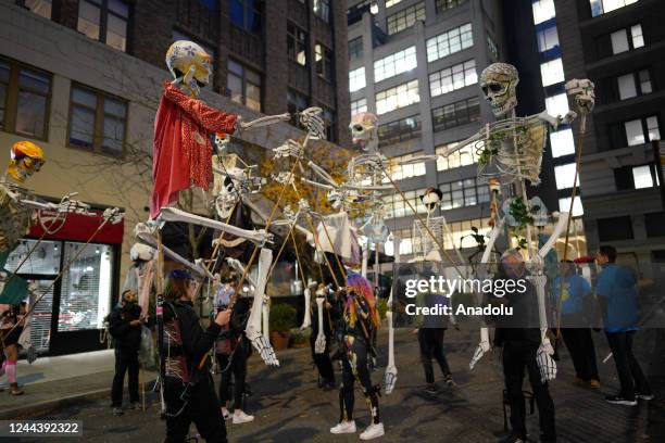 Revelers wearing different costumes attend the Halloween Parade in Lower Manhattan of New York, United States on October 31, 2022. New York City's...