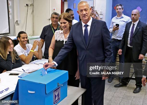 Israeli Defence Minister Benny Gantz , head of the new center-right "National Unity Party" or Hamahane Hamamlachti in Hebrew, casts his ballot as he...