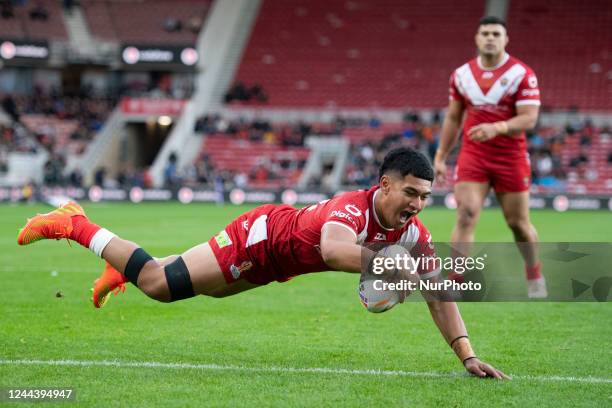 Tonga Interchange Isaiya Katoa scores a try during the 2021 Rugby League World Cup Pool D match between Tonga and Cook Islands at the Riverside...