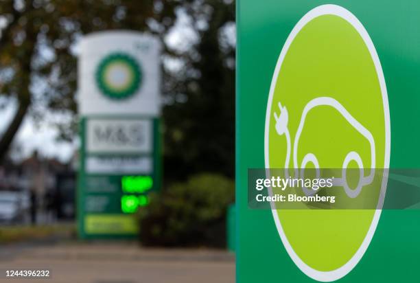 An Electric Vehicle charging sign at the entrance to a BP Plc petrol station forecourt in London, UK, on Monday, Oct. 31, 2022. BP Plc posted its...