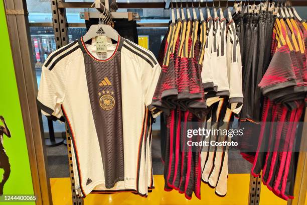Jerseys of Argentina and Germany for the 2022 Qatar World Cup are seen at the Adidas store on Nanjing Road pedestrian street in Shanghai, China, Nov...