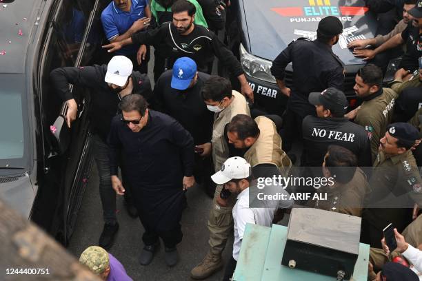 Pakistan's former prime minister Imran Khan arrives to join an anti-government march towards capital Islamabad, demanding early elections, in...