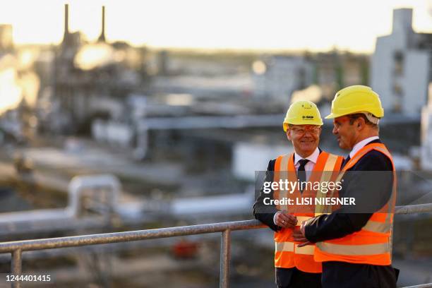 German Chancellor Olaf Scholz and Chairman of the Board of Executive Directors of BASF SE Martin Brudermueller visit the construction site of the...