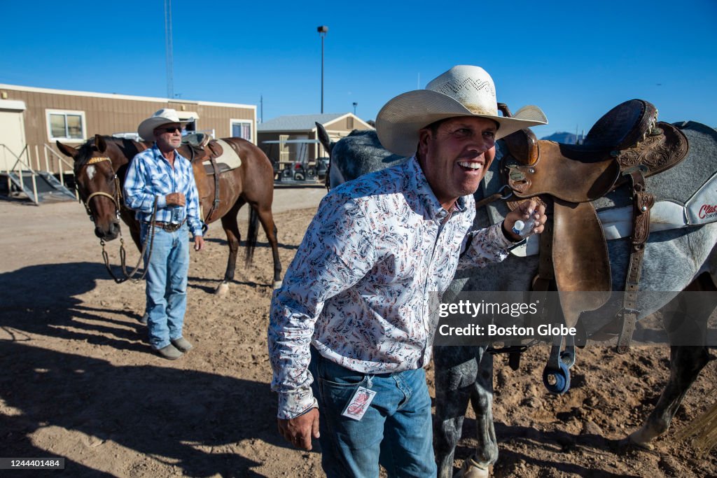David Sammon Rodeo Ken Smith, left, and David Lawson dismount their horses after... News ...
