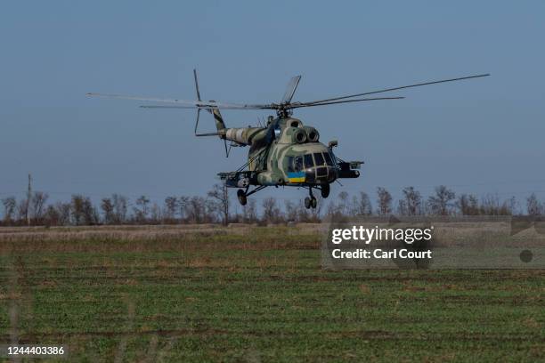 Ukrainian military helicopter flies low toward the front line on November 1, 2022 in Kotlyareve, Mykolaiv oblast, Ukraine. More vessels left...