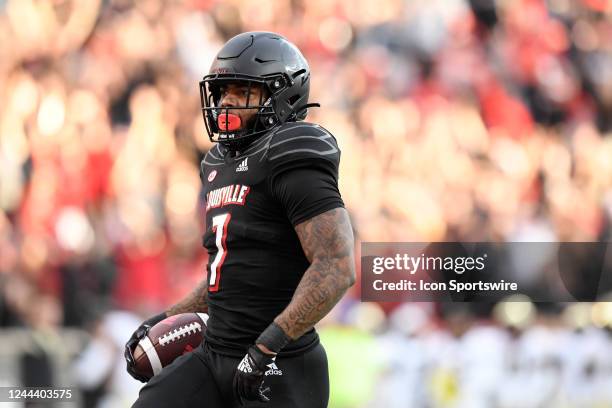 Louisville Cardinals running back Tiyon Evans carries the ball into the end zone during the college football game between the Wake Forest Demon...