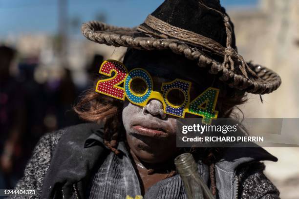 Haitians celebrate Fèt Gede, the Festival of the Dead, at the National Cemetery in Port-au-Prince, on November 1, 2022. - Fèt Gede is an annual...