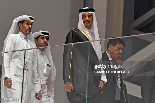 Qatar's Emir Sheikh Tamim bin Hamad al-Thani arrives for the opening of the Arab summit in Algiers on November 1, 2022. - Arab leaders gathered in...