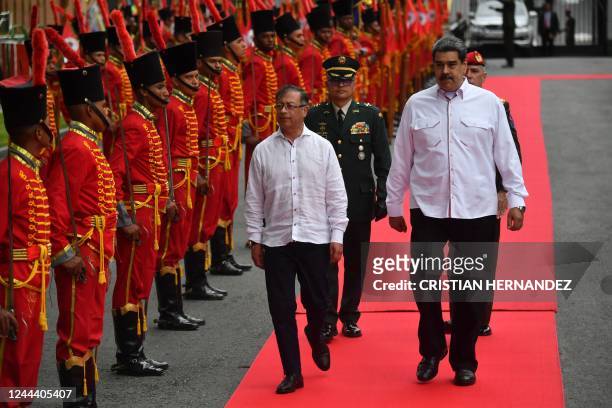Venezuelan President Nicolas Maduro welcomes Colombian President Gustavo Petro at Miraflores Presidential Palace in Caracas, on November 1, 2022. -...