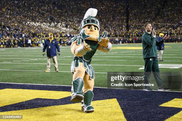 Michigan State mascot Sparty cheers during a college football game between the Michigan State Spartans and the Michigan Wolverines on October 29,...