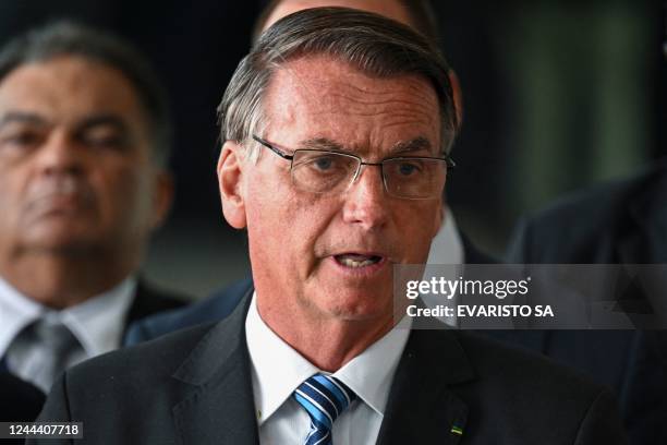 Brazilian President Jair Bolsonaro makes a statement for the first time since Sunday's presidential run-off election, at Alvorada Palace in Brasilia,...