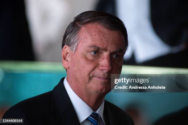 President of Brazil Jair Bolsonaro looks on after a press conference two days after being defeated by Lula da Silva in the presidential runoff at...