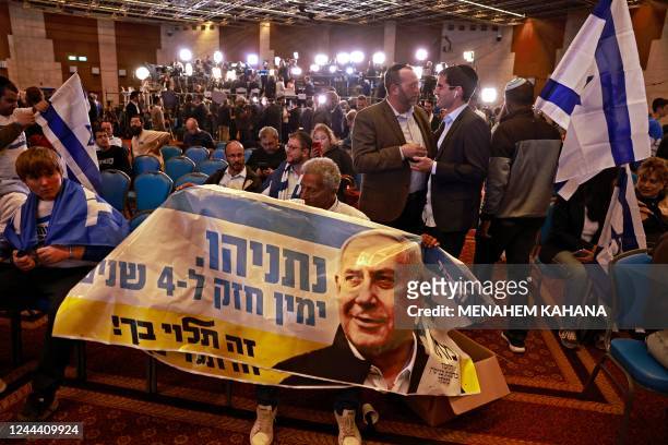 Israel's Likud party supporters gather at their campaign headquarters in Jerusalem on November 1 after the end of voting in the fifth national...